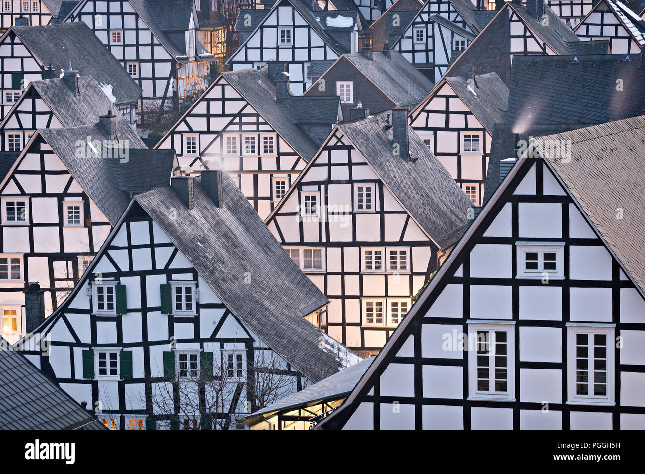 Medieval architecture in half-timbered houses in the colors black and white in Alter Flecken, the center of Freudenberg, Germany. Stock Photo