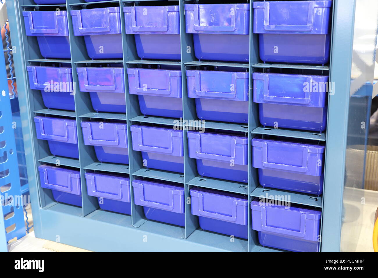 Plastic drawer for keeping parts in factory Stock Photo