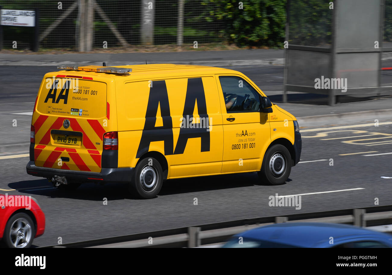 AA breakdown van travelling along a road Stock Photo - Alamy