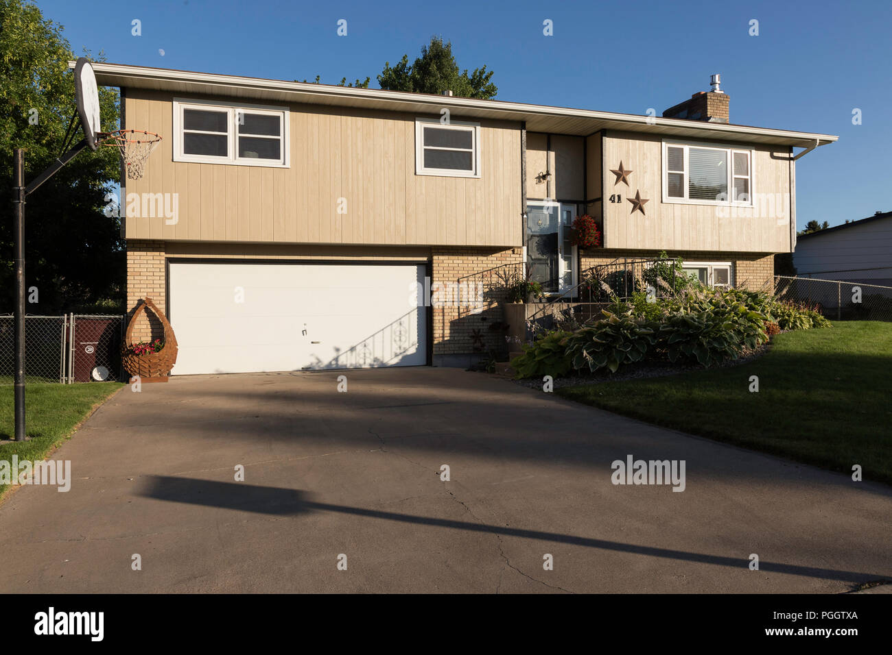 Residential House Exterior in Middle Class Neighborhood, MT, USA Stock Photo