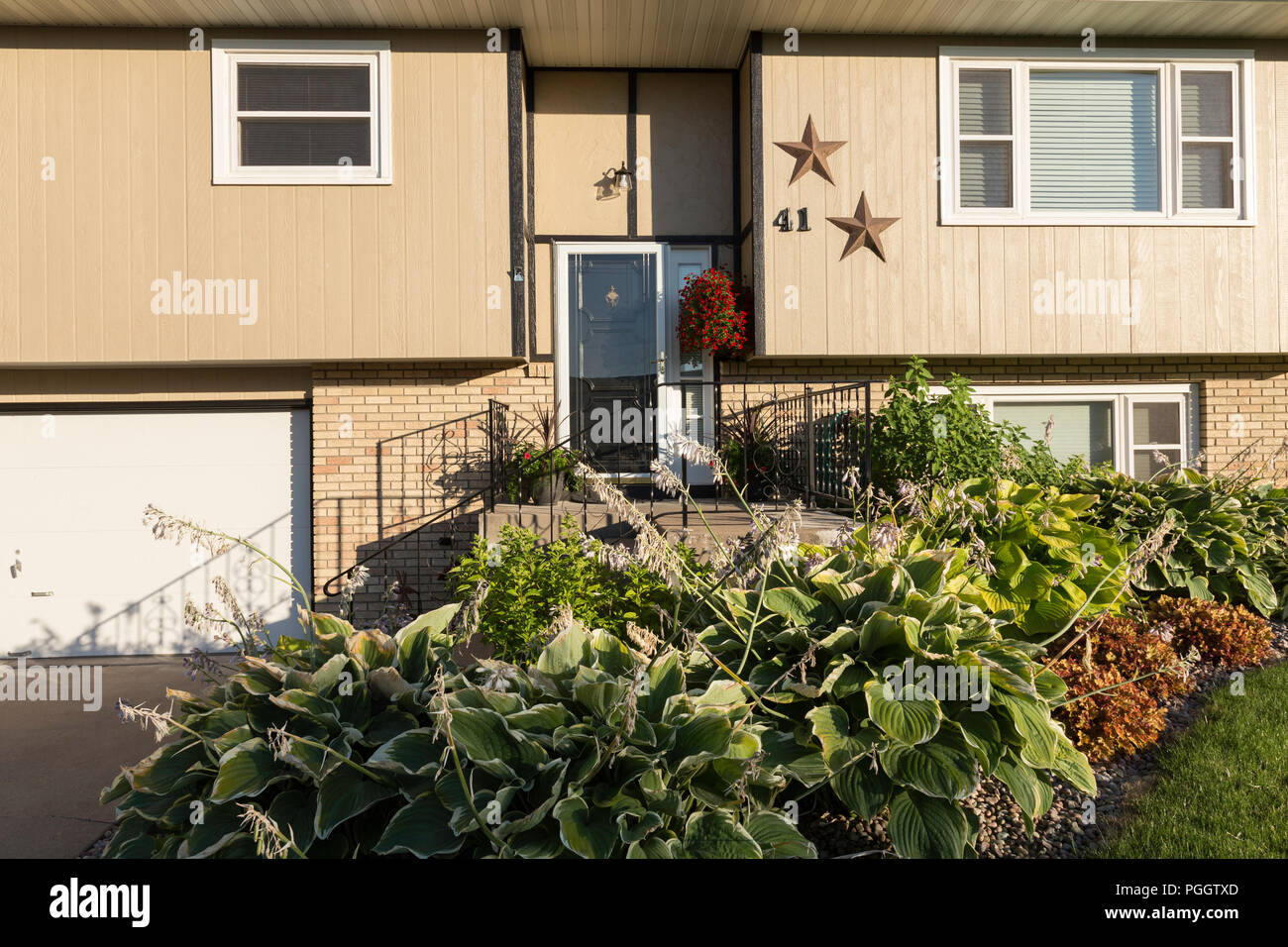 Residential House Exterior in Middle Class Neighborhood, MT, USA Stock