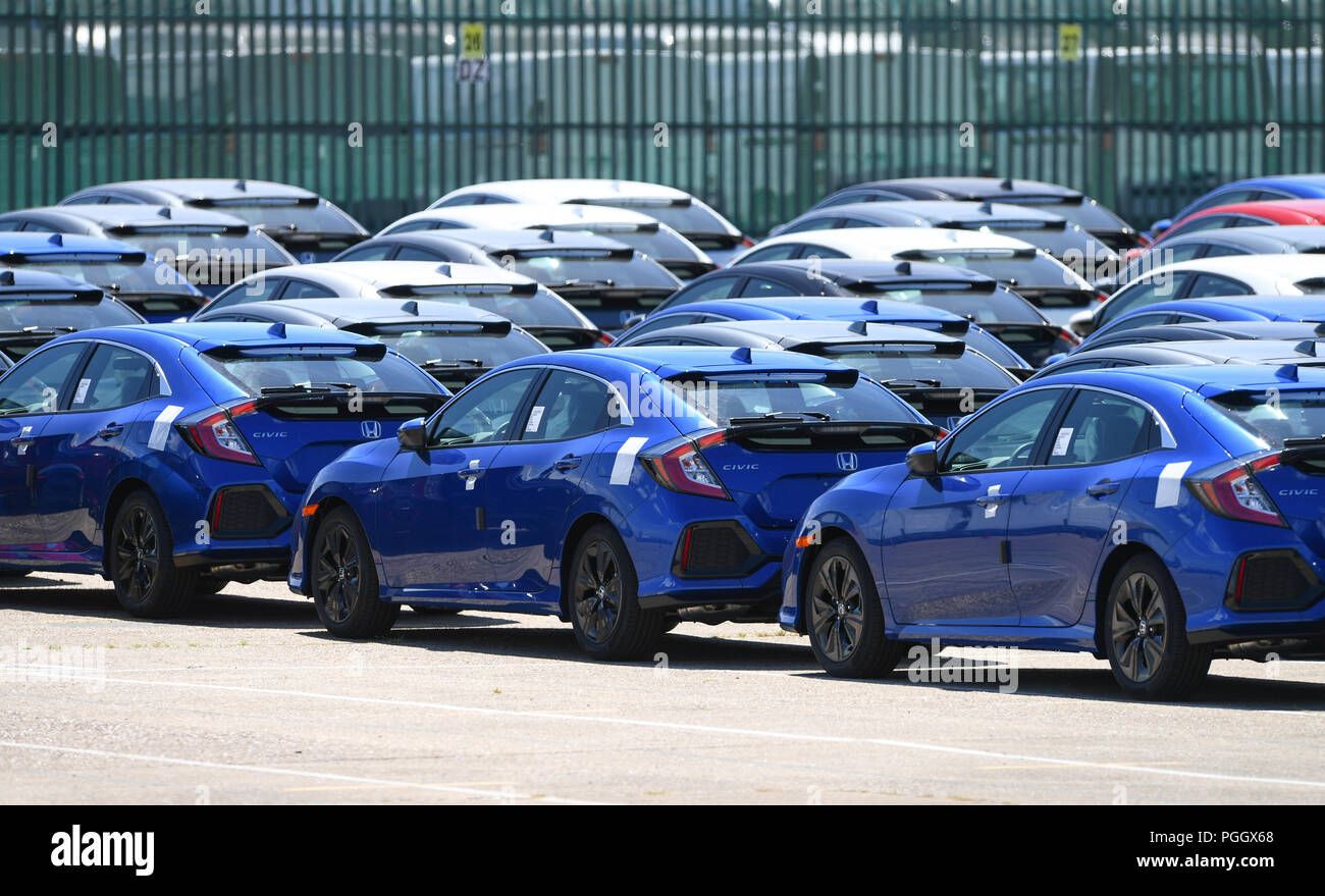 Hundreds of Honda cars and SUVs awaiting export sat in holding areas in Southampton docks UK. Stock Photo