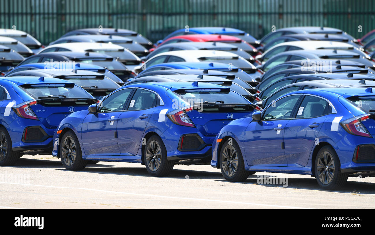 Hundreds of Honda cars and SUVs awaiting export sat in holding areas in Southampton docks UK. Stock Photo