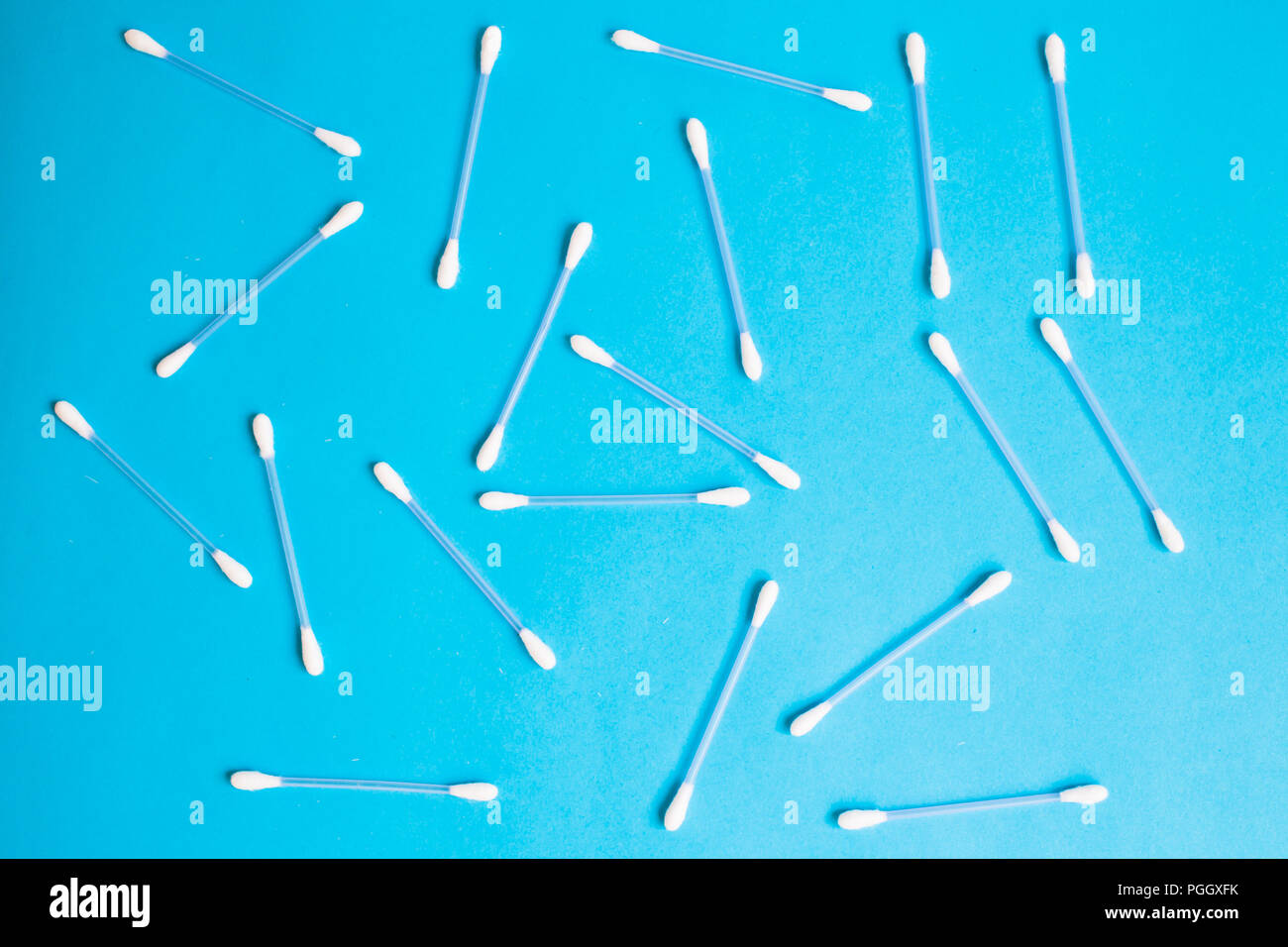 the pattern of the cotton buds on a blue background Stock Photo