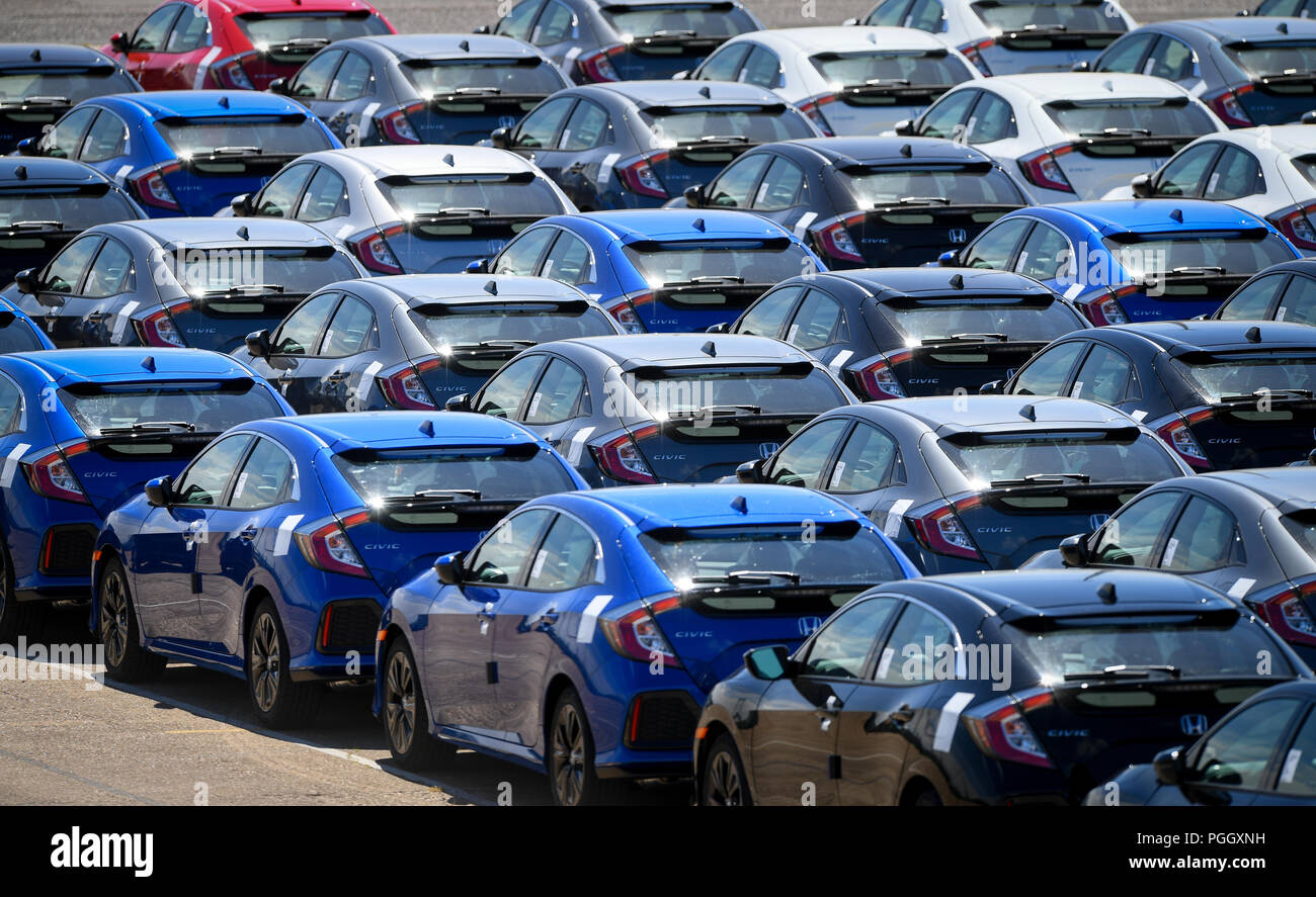 Hundreds of Honda cars and SUVs awaiting export sat in holding areas in Southampton docks UK. Stock Photo