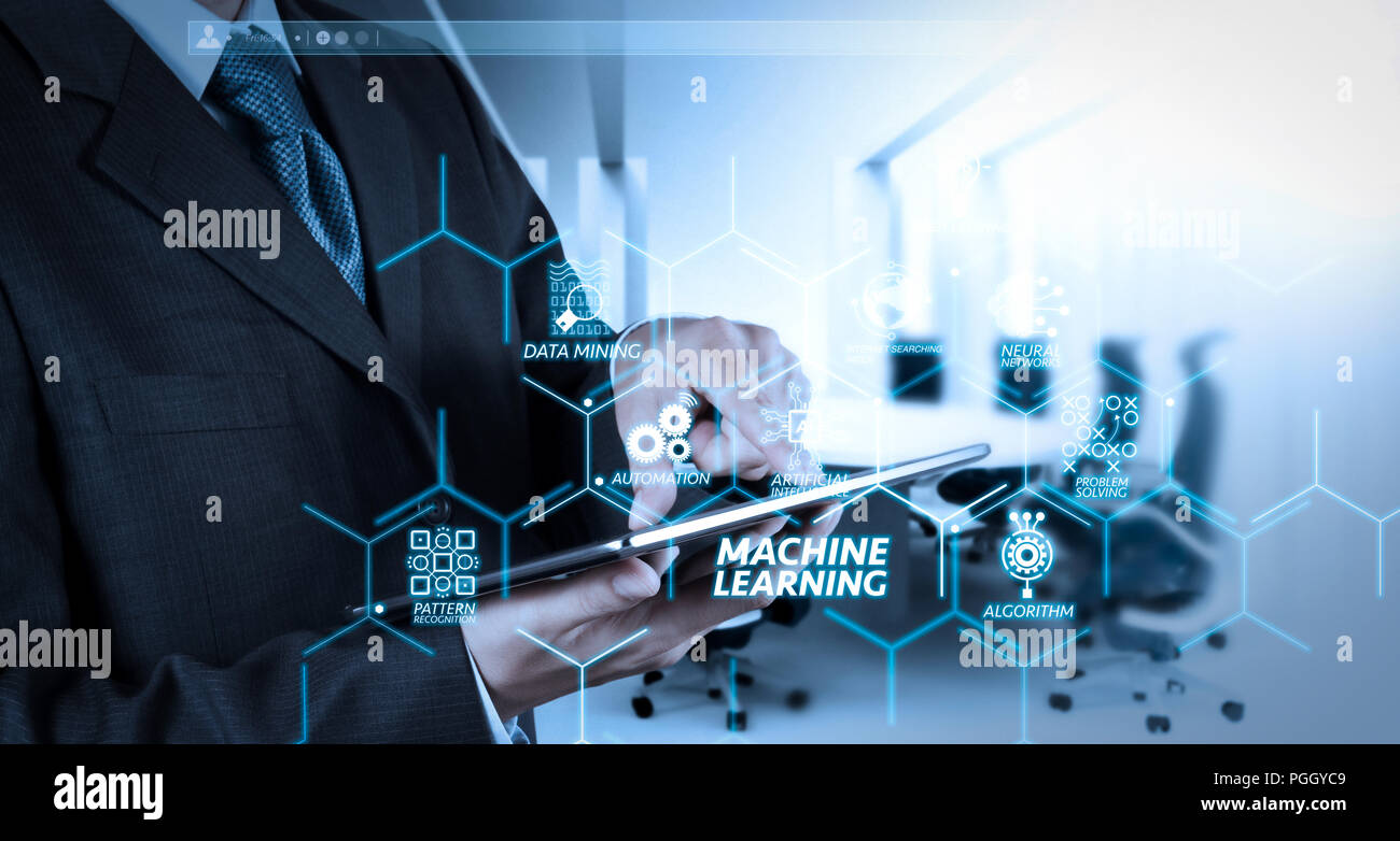 Machine learning technology diagram with artificial intelligence (AI),neural network,automation,data mining in VR screen.Businessman hand working with Stock Photo