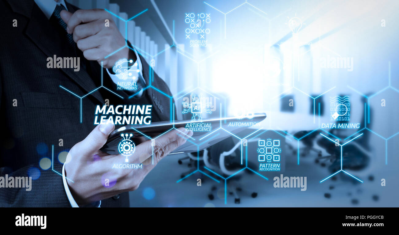 Machine learning technology diagram with artificial intelligence (AI),neural network,automation,data mining in VR screen.Businessman hand working with Stock Photo