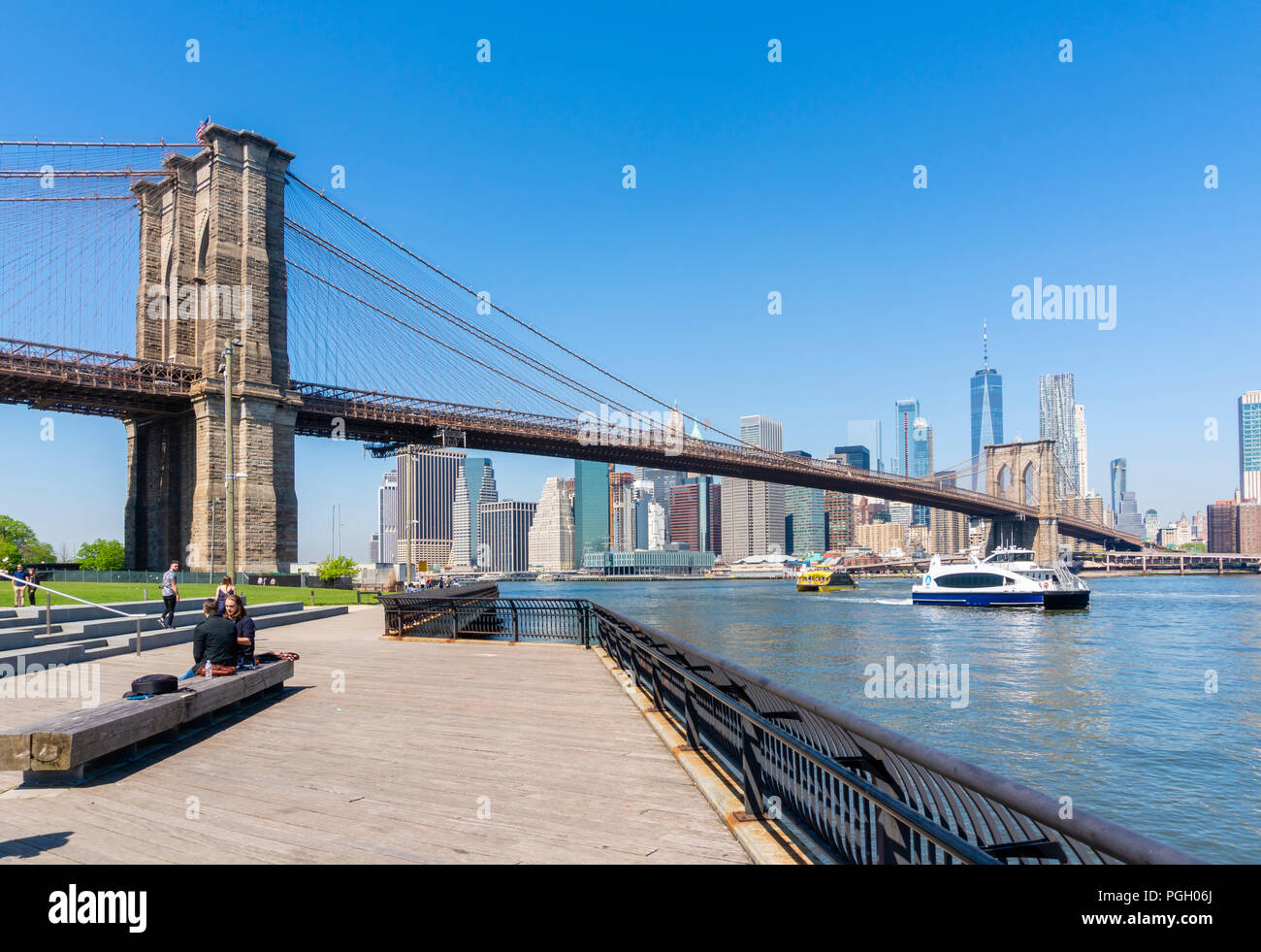 Tourists visiting the Brooklyn Bridge Stock Photo