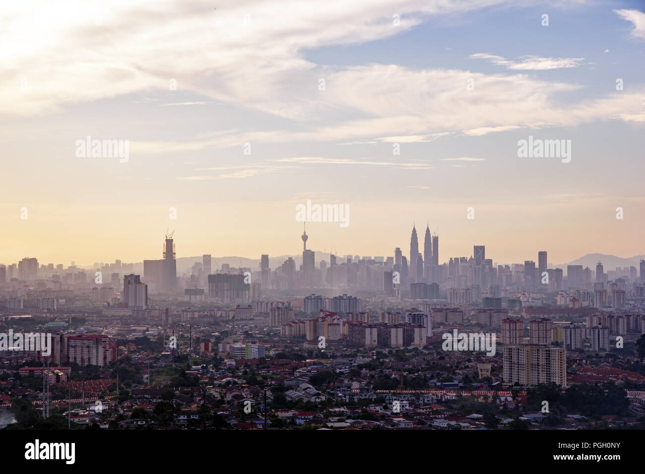 Kuala Lumpur’s iconic skyline and skyscrapers in late afternoon with ...