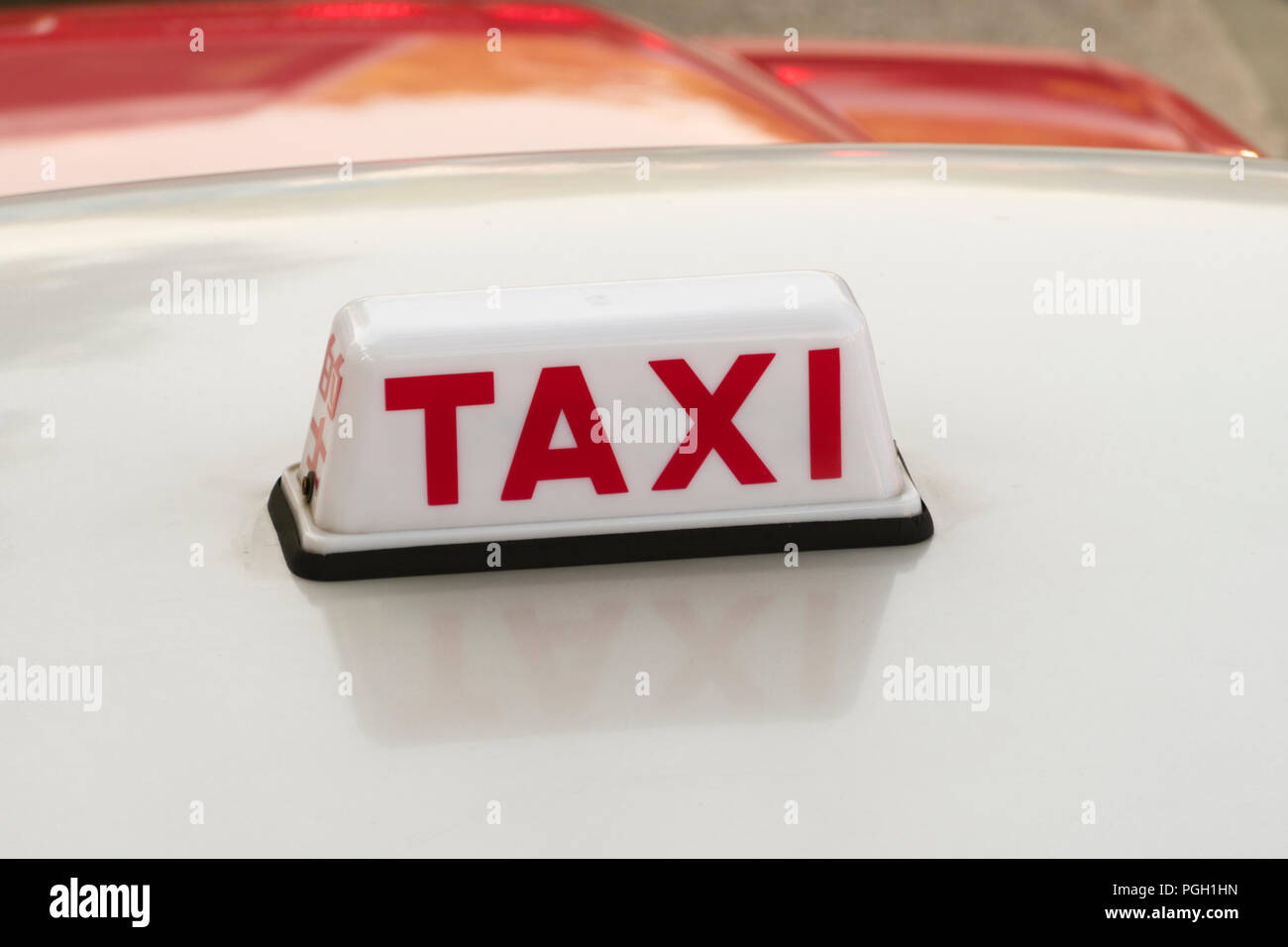 Sign of a taxi in Hong Kong Stock Photo