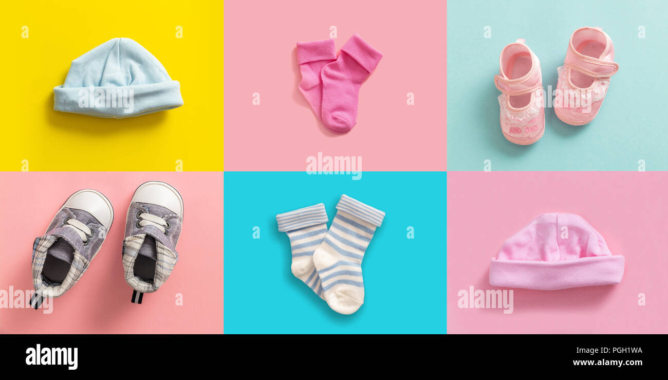 Twins babies shower concept. Baby boy and girl shoes and socks collage, pastel colored background Stock Photo