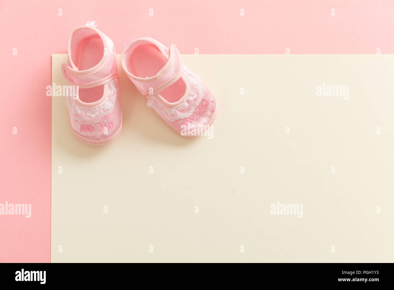 Baby girl shoes, shower invitation concept on pastel colors background,  copy space, top view Stock Photo - Alamy