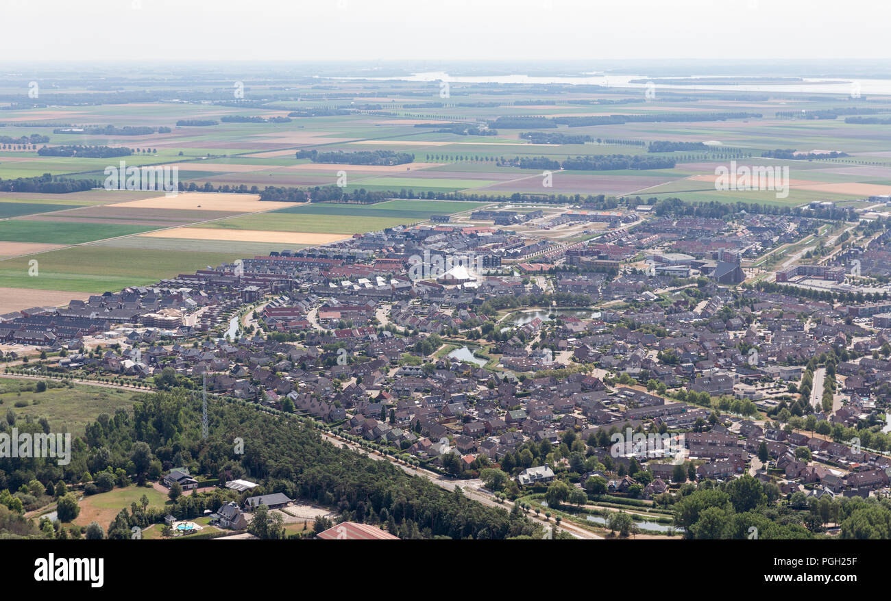 Aerial view Dutch village Urk with residential area and agriculture Stock Photo