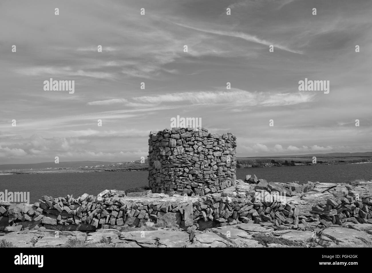 Remains of a round tower on the Eastern shore of Inishmore, Aran Islands. Stock Photo