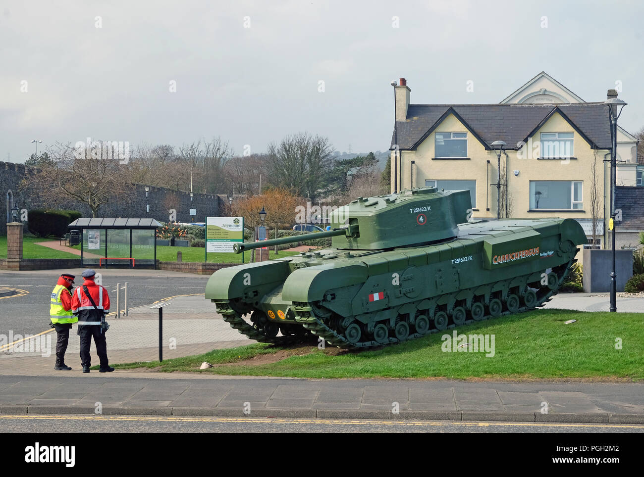 Traffic wardens deliberating, Carrickfergus, County Antrim. Stock Photo