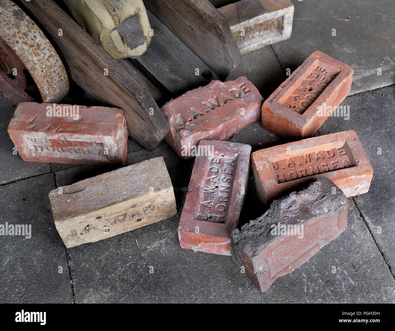 Old bricks made in local brickyard. Stock Photo