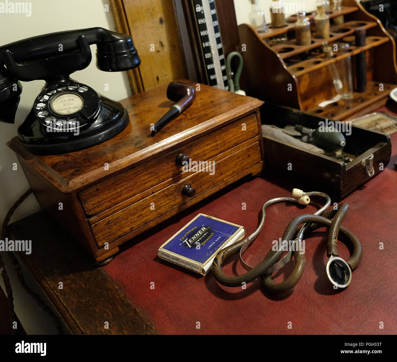 Set piece exhibit of vintage doctor's surgery with stethoscope and telephone. Stock Photo