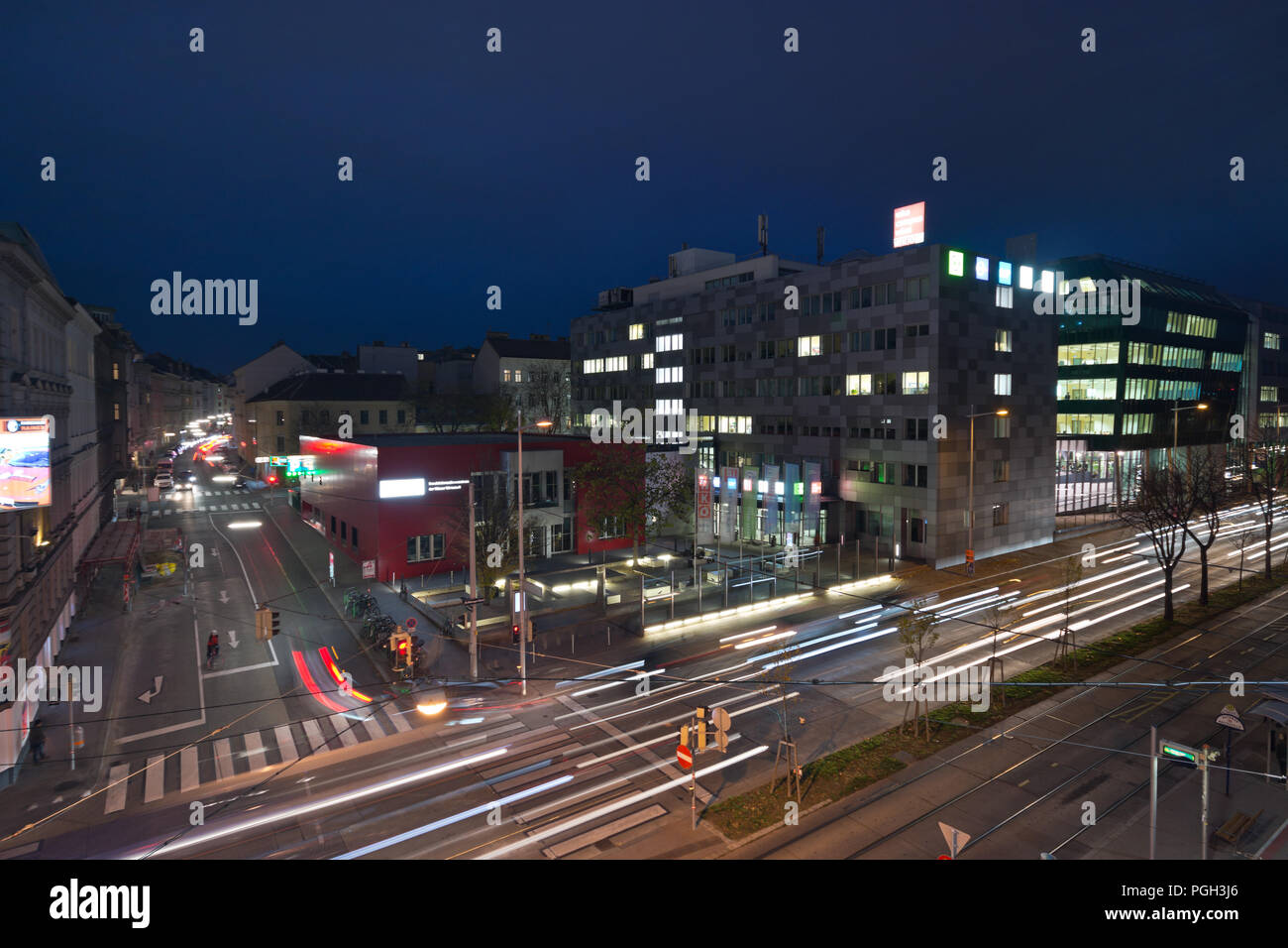 nightly traffic on the Waehringer Guertel road intersection with Gentzgasse  aerial view. WKO and WIFI campus in background Stock Photo - Alamy