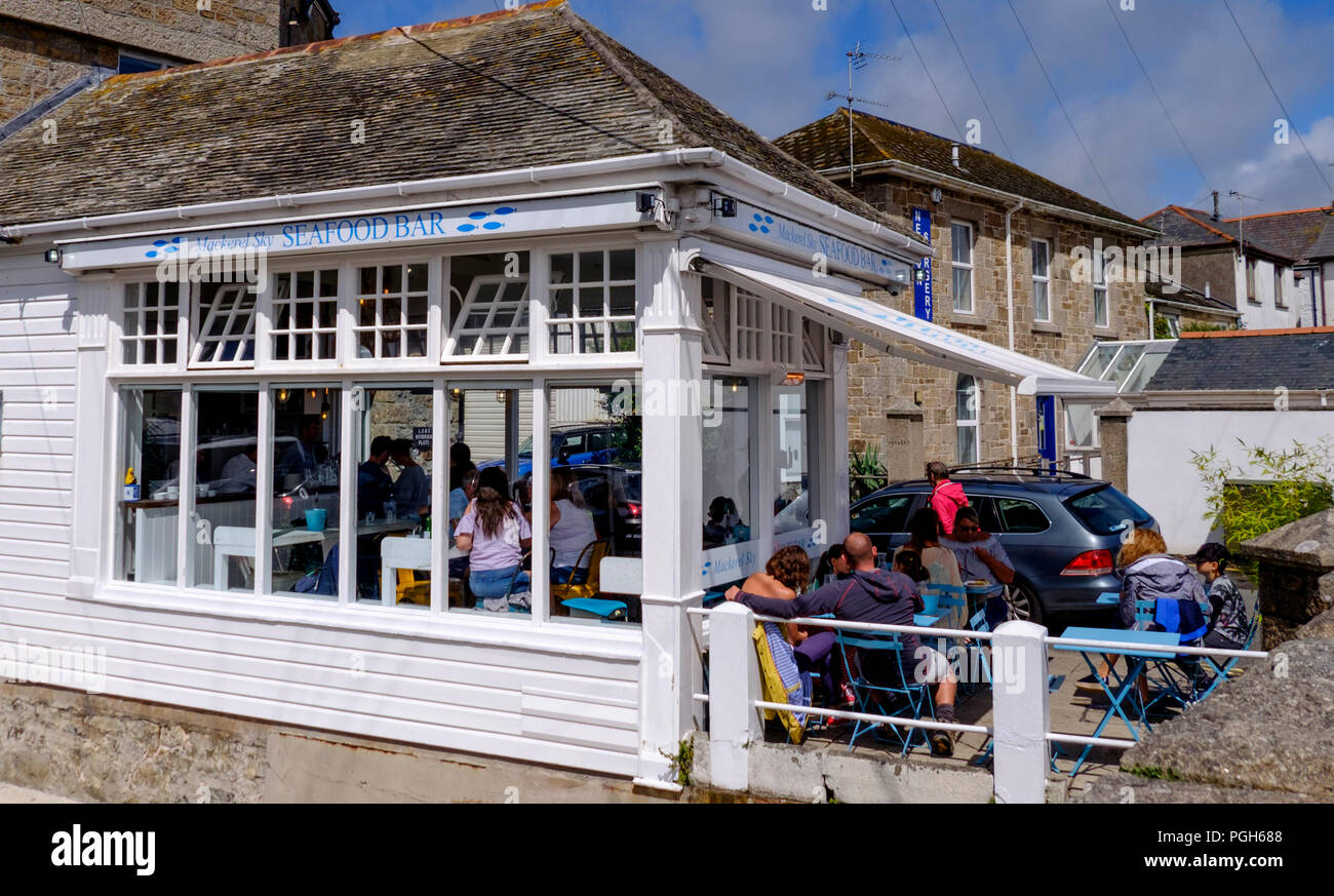Around Newlyn an active fishing village on the Cornish coast. Cornwall england UK Mackerel Sky
