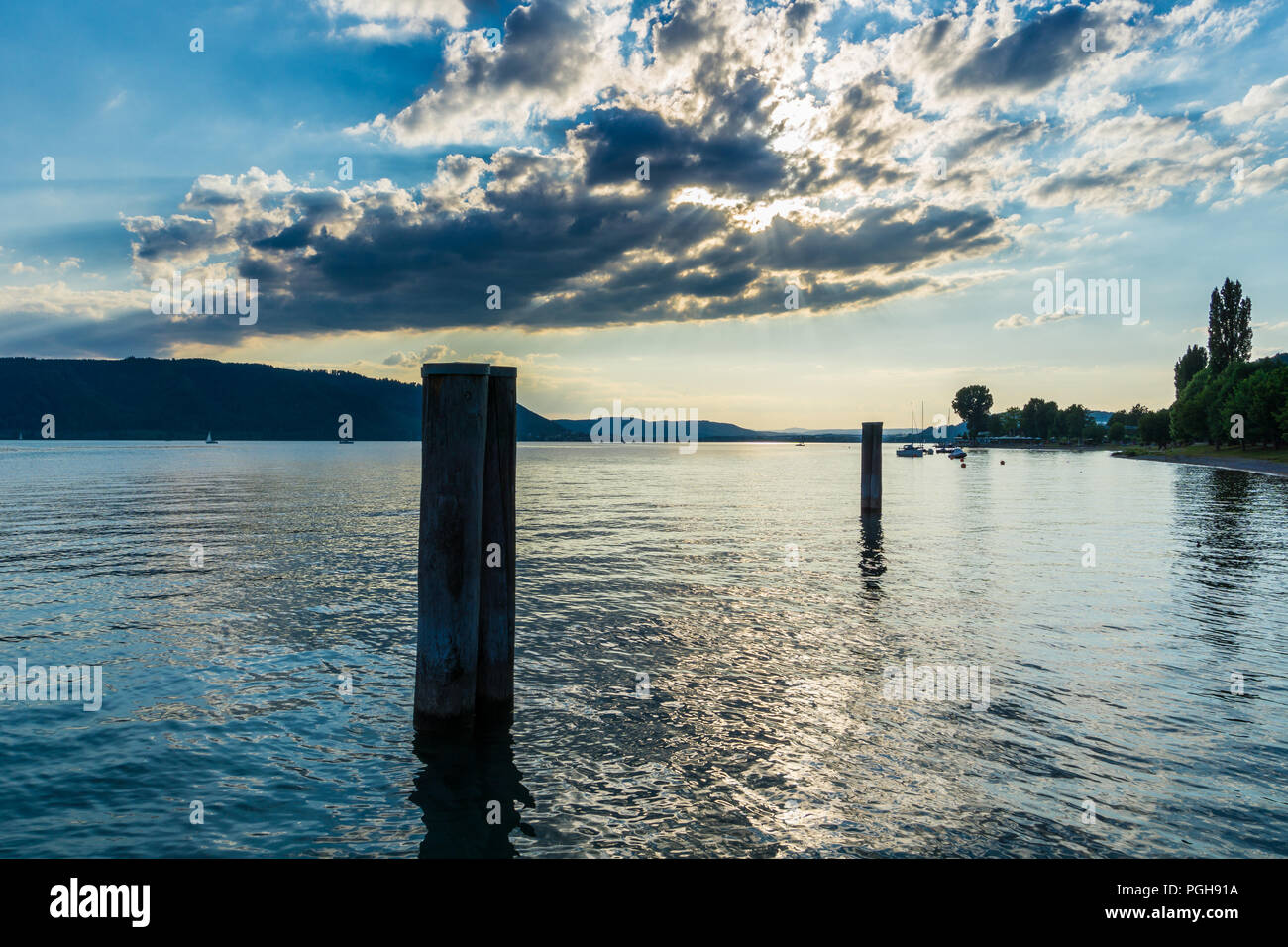 Germany, Lake Constance beach in dawning light Stock Photo