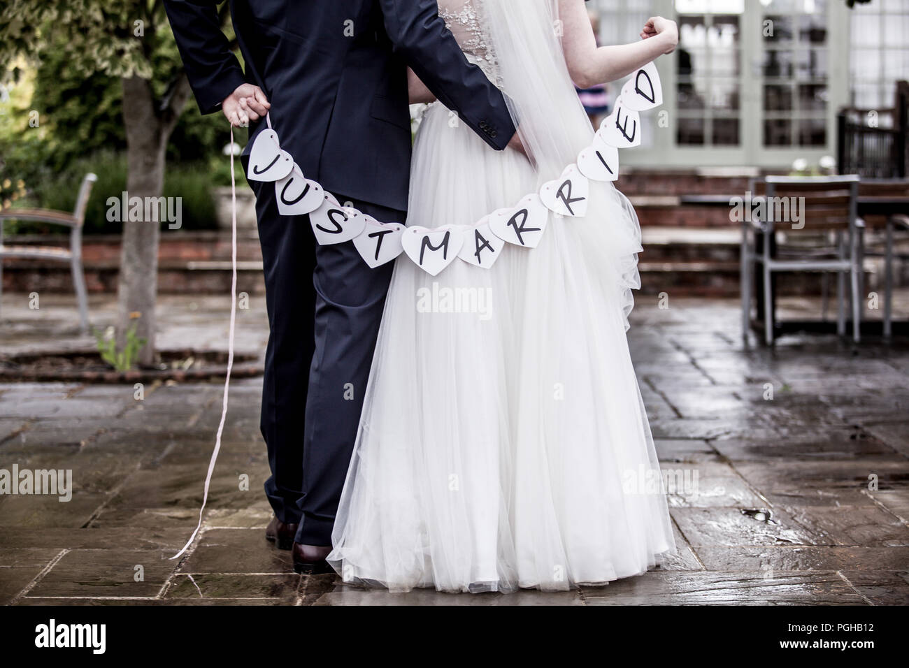 Holding each other around the waist hi-res stock photography and images ...