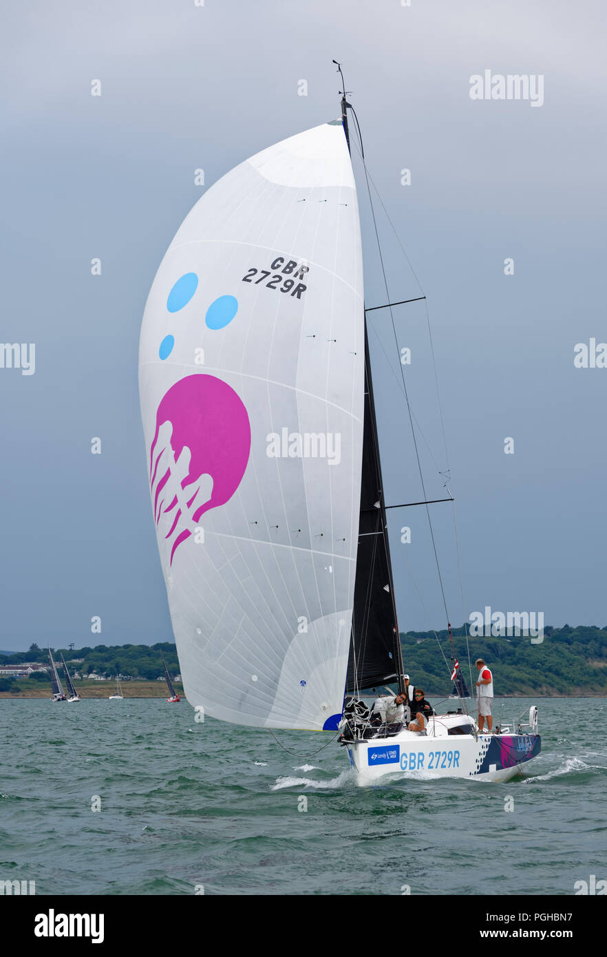 Sailing Yacht Jellyfish GBR2729R a Jeanneau Sunfast 3600 competes during the Cowes Week regatta off the coast of the Isle of Wight Stock Photo