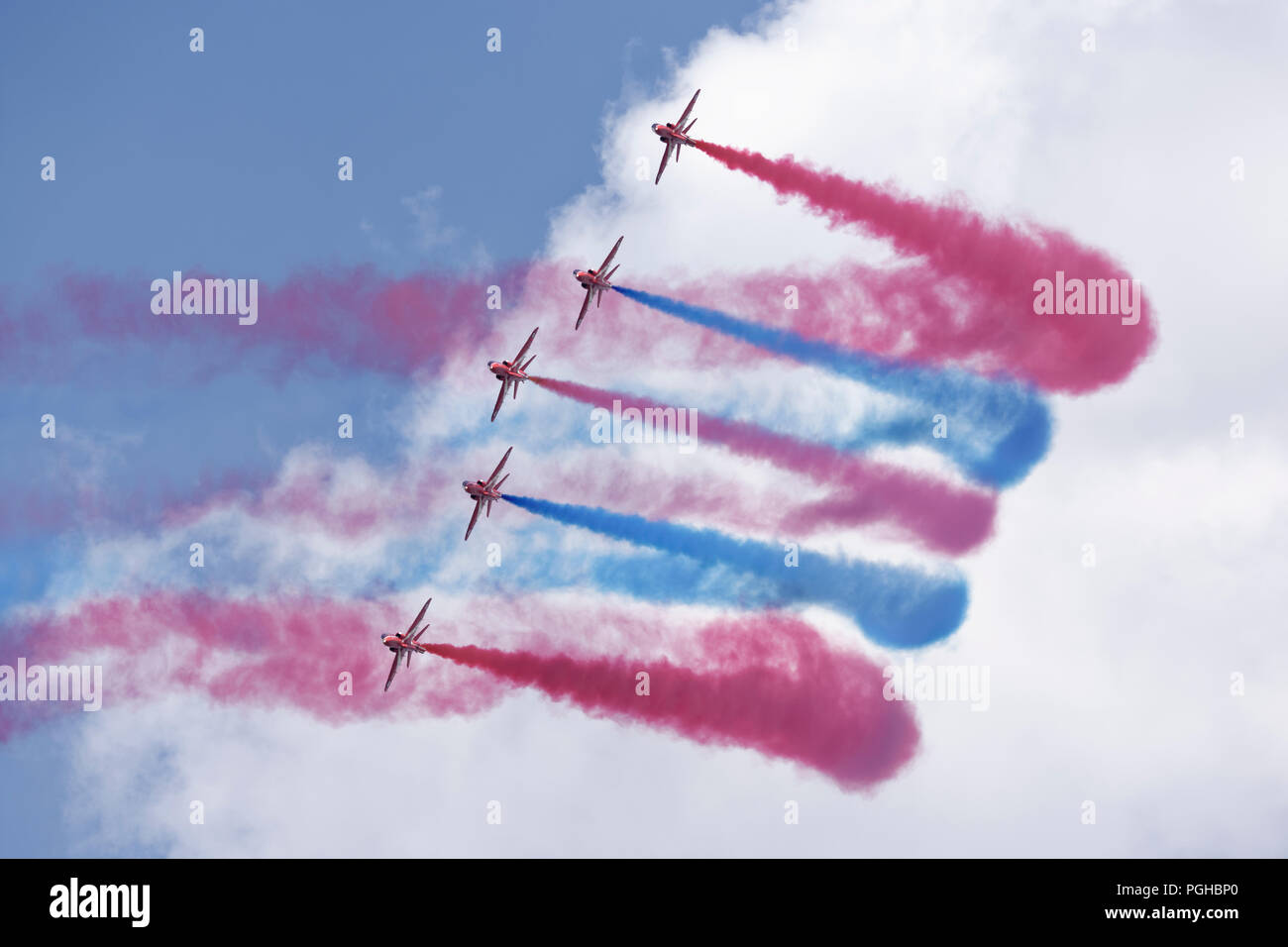 The British Royal Air Force Red Arrows Military Aerobatic Display team Enid section of 5 Hawk Jet Trainers display at the RIAT Stock Photo