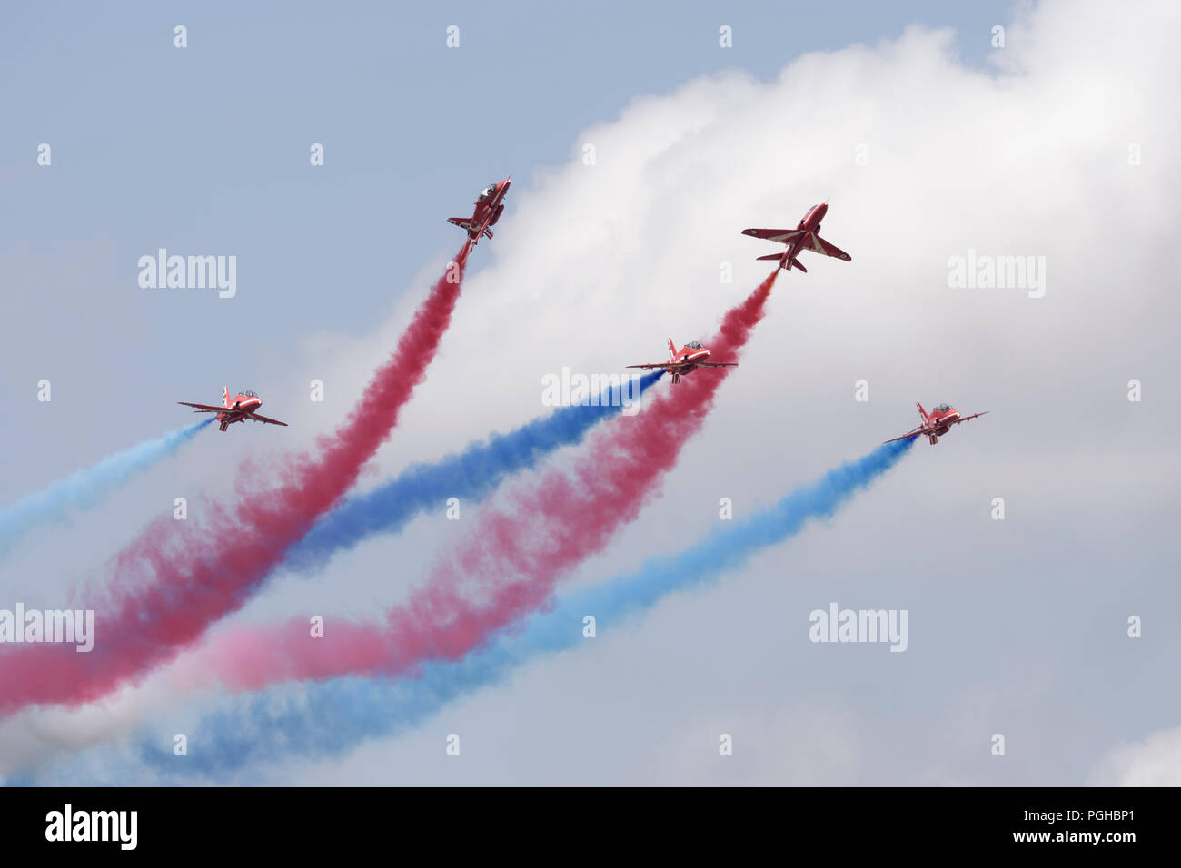 The British Royal Air Force Red Arrows Military Aerobatic Display team Enid section of 5 Hawk Jet Trainers performing rollbacks at the RIAT Stock Photo