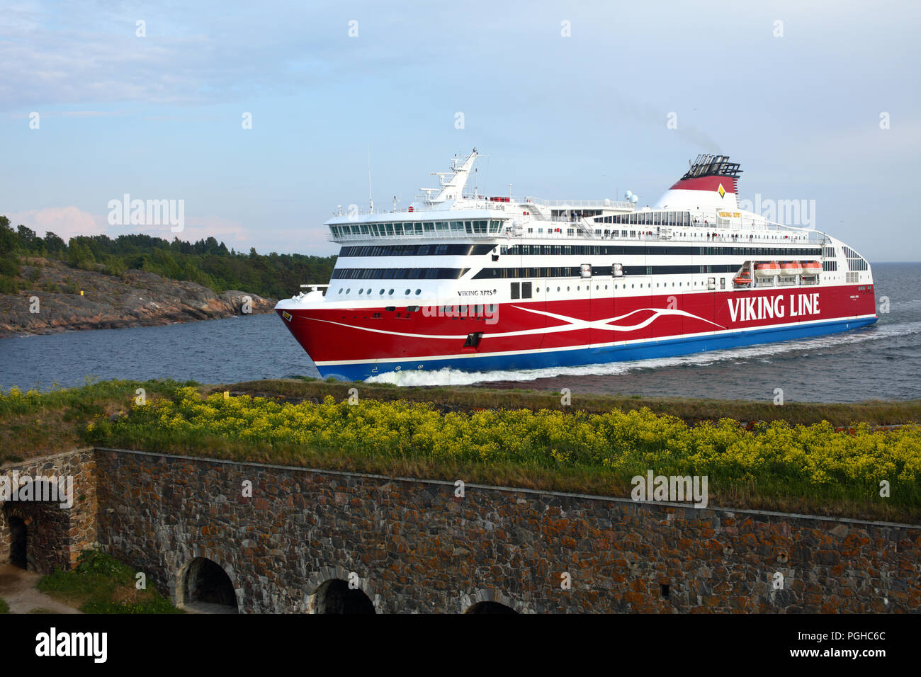 Helsinki, Finland - June 11, 2018: Cruiseferry Viking XPRS of Viking Line going to the port of Helsinki near Suomenlinna fortress. Suomenlinna is UNES Stock Photo