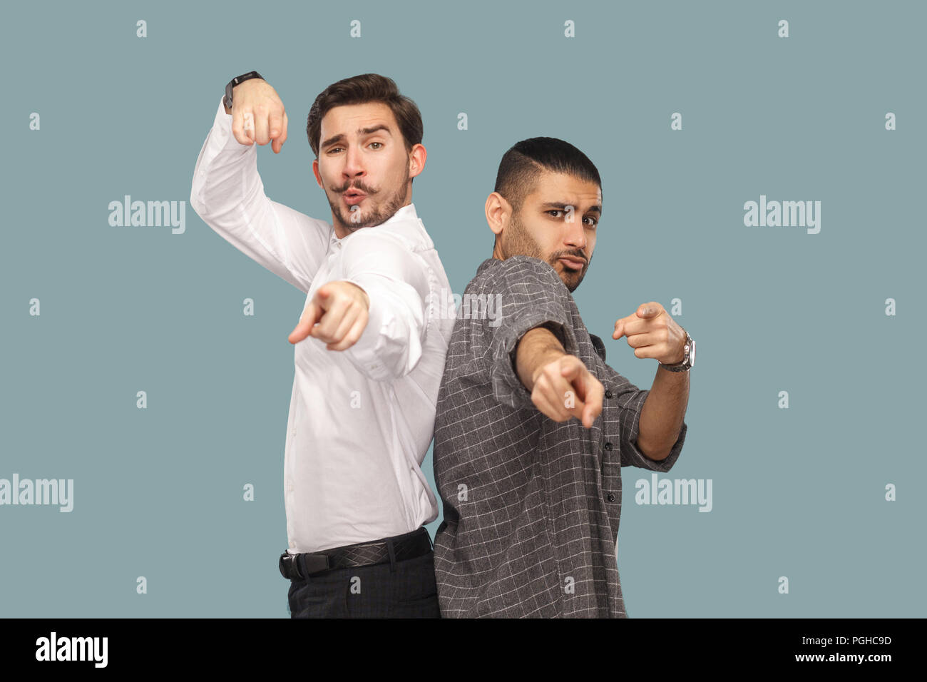 Now is your time to win. portrait of two handsome bearded friends or ...