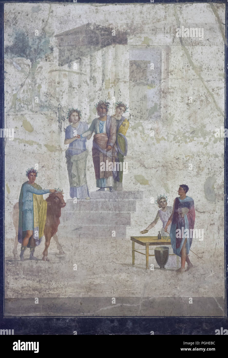 Jason and King Pelias depicted in the Roman fresco from the House of Jason (Casa di Giasone) in Pompeii (20-25 AD), now on display in the National Archaeological Museum (Museo Archeologico Nazionale di Napoli) in Naples, Campania, Italy. King Pelias stops on the steps of a temple as he recognises young Jason by his missing sandal, the hero who has just joined the royal household as the man, who, according to an oracle, will bring his reign to an end. For this reason King Peleas has stopped, terrified, on the steps of a temple near which, with the aid of his sons, he is in the act of sacrificin Stock Photo