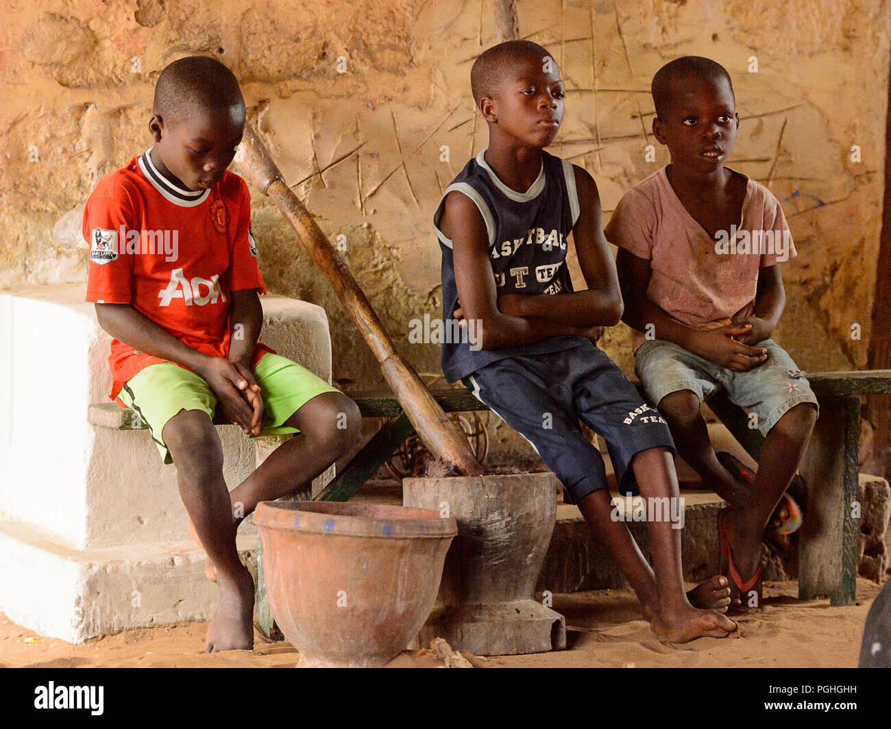 LOME, TOGO - Jan 9, 2017: Unidentified Togolese young boys sit on the ...