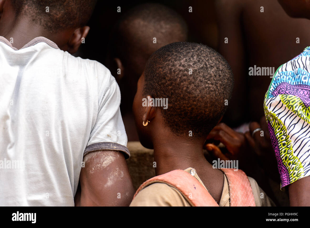 LOME, TOGO - Jan 9, 2017: Unidentified Togolese young girl from behind near  the local shaman's house. Togo people suffer of poverty due to the bad eco  Stock Photo - Alamy