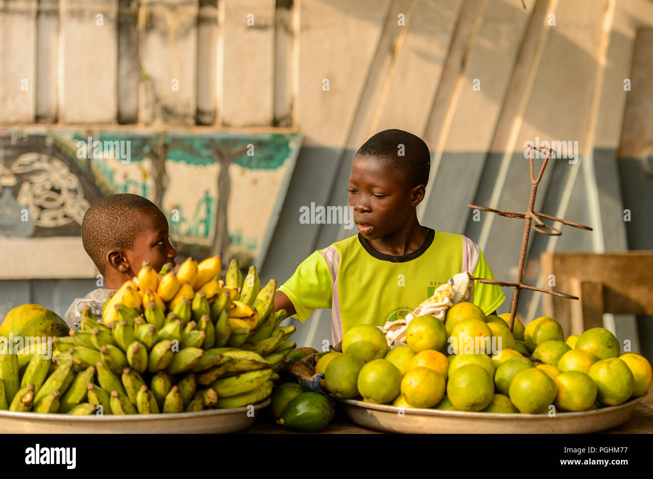 OUIDAH, BENIN - Jan 10, 2017: Unidentified Beninese little boys sell