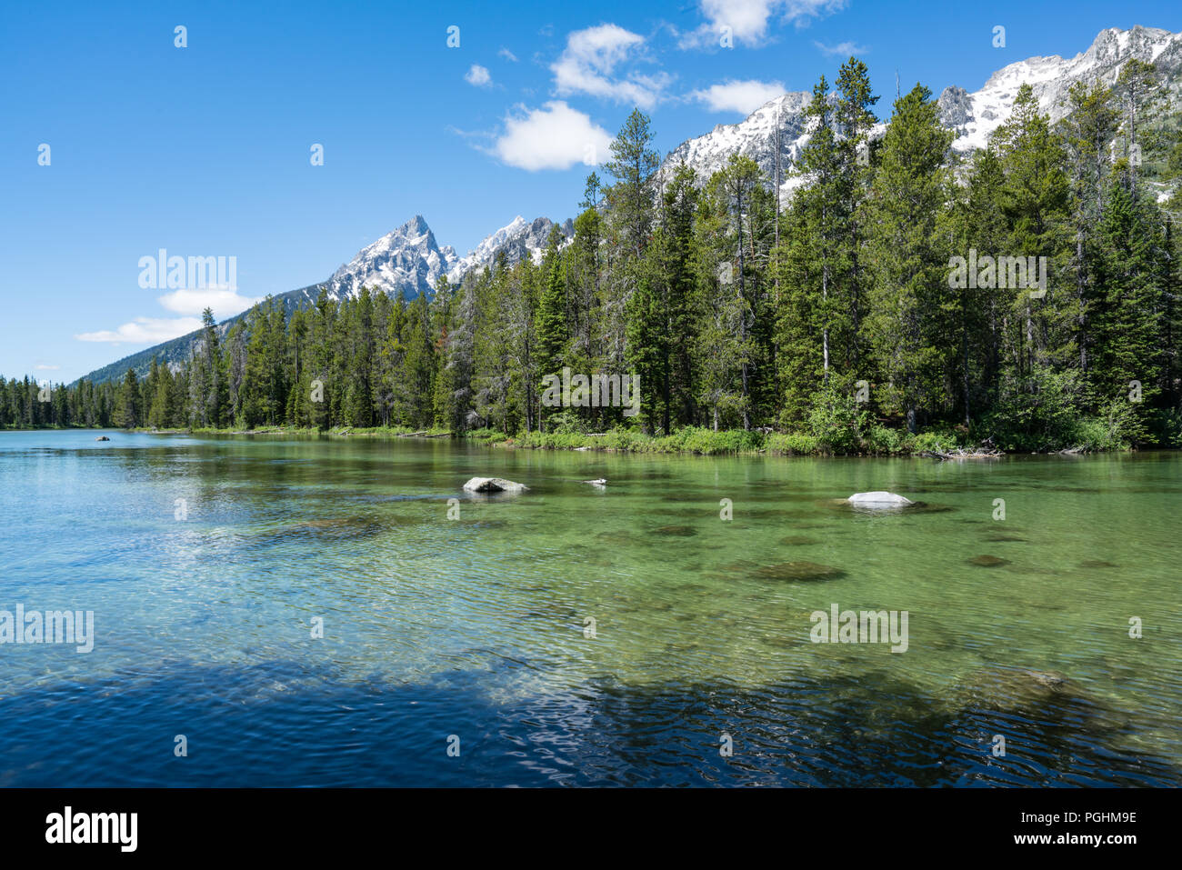 Crystal clear water of String Lake Teton National Park, Wyoming Stock Photo