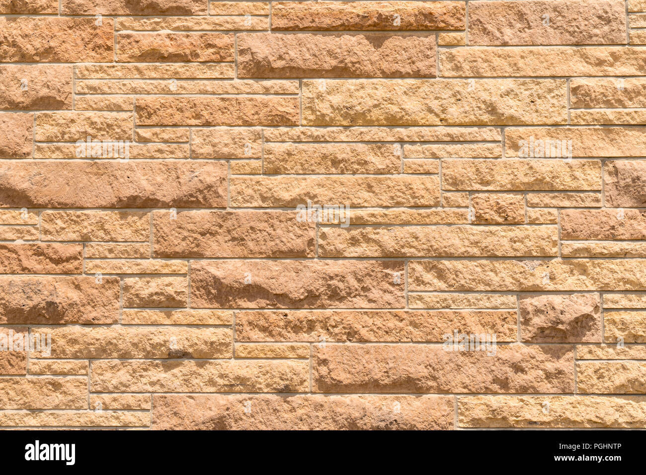 Old masonry historic stone wall background Stock Photo