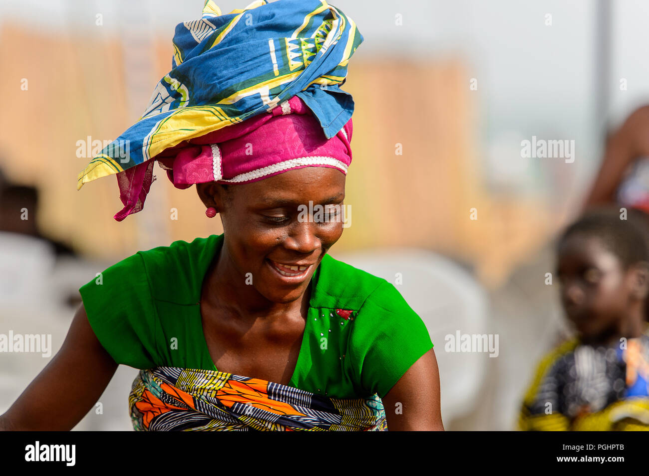 OUIDAH, BENIN - Jan 10, 2017: Unidentified Beninese woman in colored