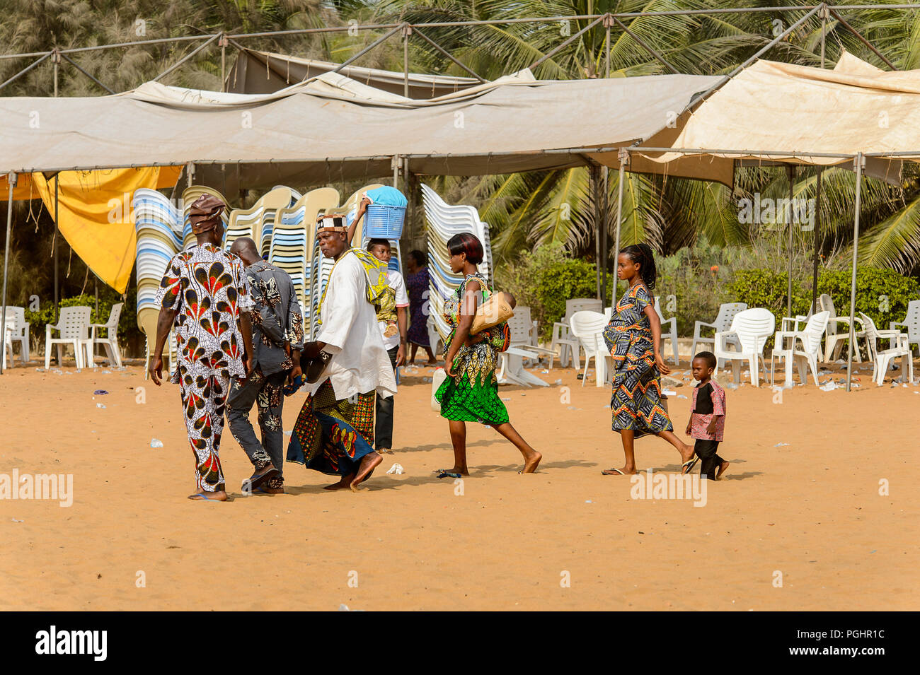 OUIDAH, BENIN - Jan 10, 2017: Unidentified Beninese people walk at the ...