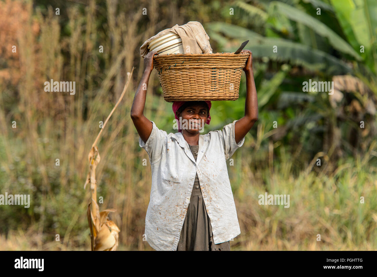 Kumasi Ghana Jan 16 2017 Unidentified Ghanaian Woman Carries A Basket On Her Head Along The