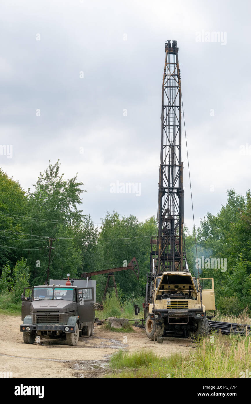 Mobile oil rig truck drilling the oil well Stock Photo
