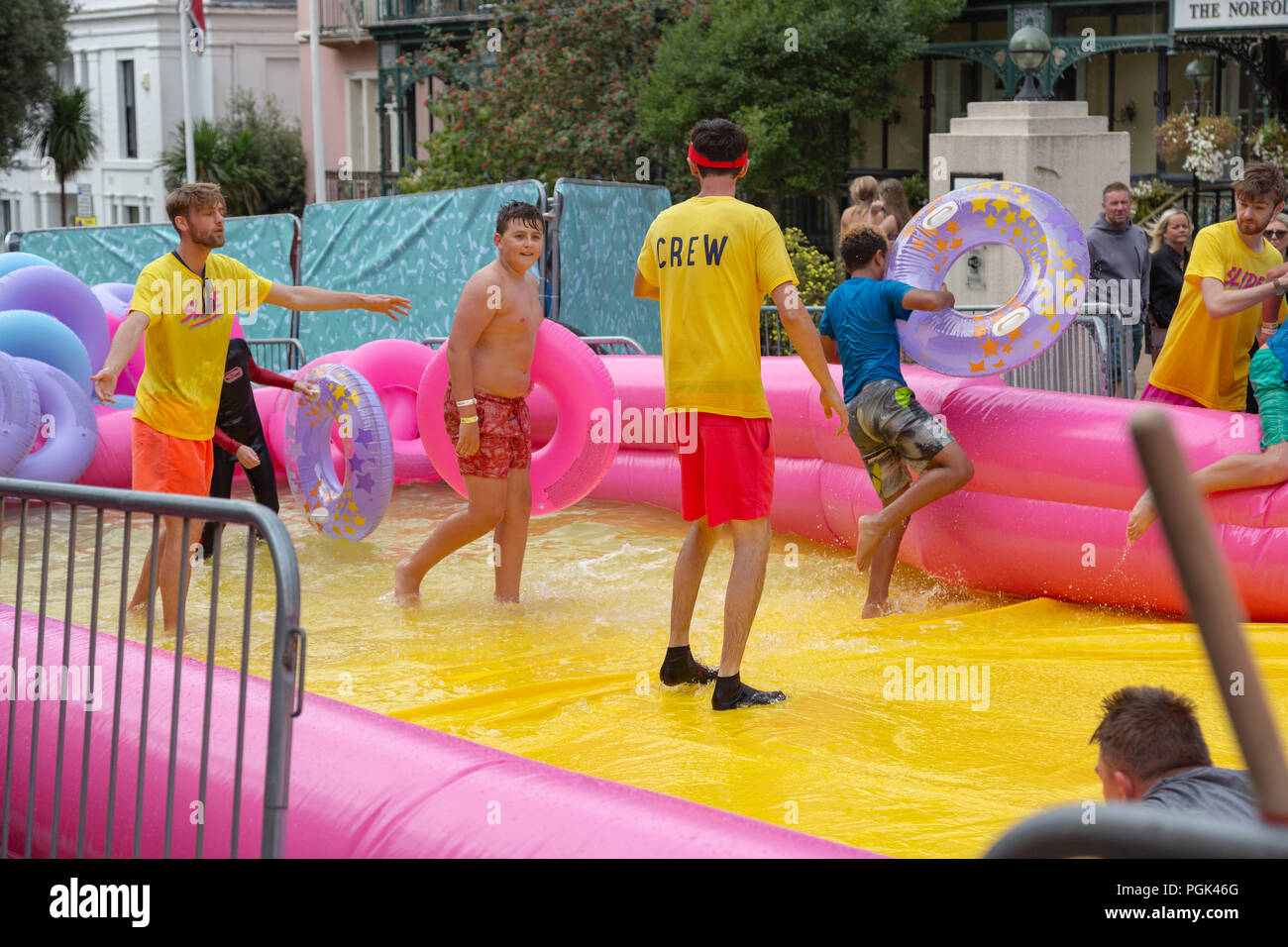 Giant Water Slide Bournemouth UK. 27th August 2018. After being not