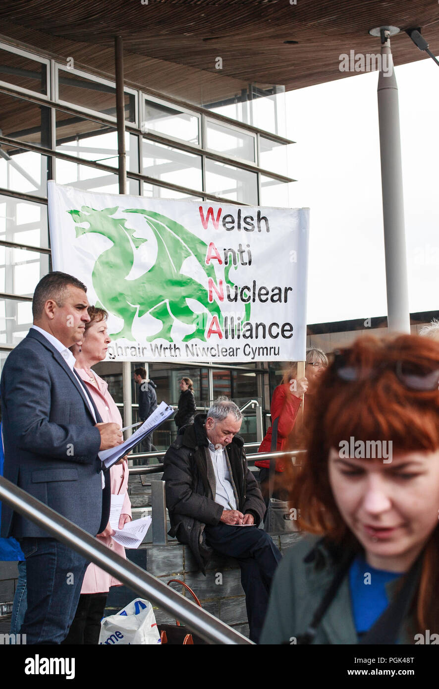 Cardiff, UK. 27th August, 2018. A protest was held outside of the Welsh Assembly Building (Senedd) in Cardiff with around 200 people voicing their opposition to nuclear mud being dumped in Wales. The speakers attending the rally included: Jill Evans, Iestyn Robert, Cian Ciaran, Cllr Nick Hodges, Richard Bramhall, Tim Richards and the controversial Neil McEvoy. Taz Rahman/Alamy Live News Stock Photo