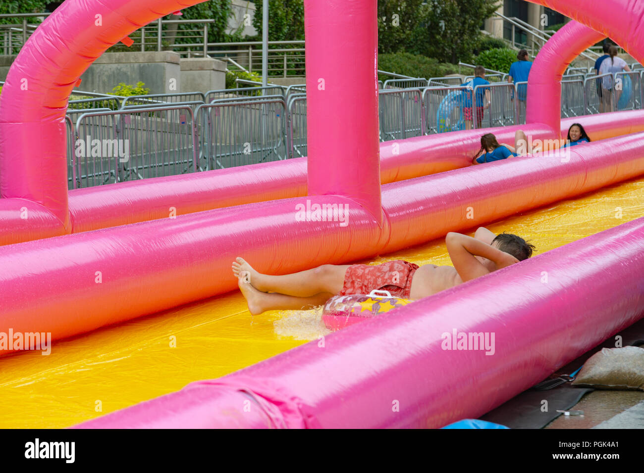 Giant Water Slide Bournemouth UK. 27th August 2018. After being not