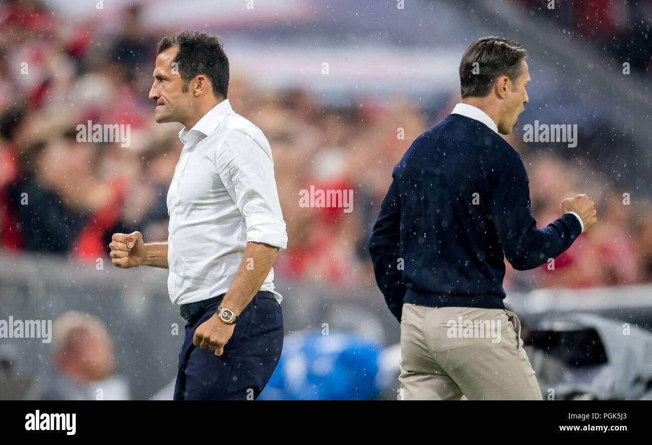 24 August 2018, Germany, Munich, Allianz Arena, Soccer 1st Bundesliga, 1st  Matchday, FC Bayern Muenchen vs TSG 1899 Hoffenheim: Munich's coach Niko  Kovac (behind) and sports director Hasan Salihamidzic - goal celebration. (