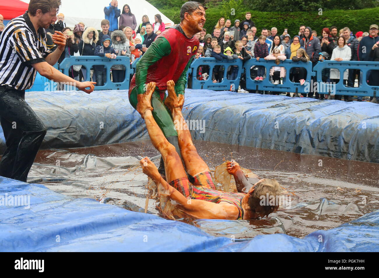 Stacksteads, Bacup, Lancashire, UK. 27 August 2018.The  World Gravy Wrestling Championships at the Rose ‘n Bowl, Stacksteads to raise funds for the East Lancashire Hospice and competitors nominated charities.     A wild and whacky wrestling competition in a 16,000 litre pool full of Lancashire Gravy! All our contestants get sponsorship and really give it their all to raise Credit: Phil Taylor/Alamy Live News Stock Photo