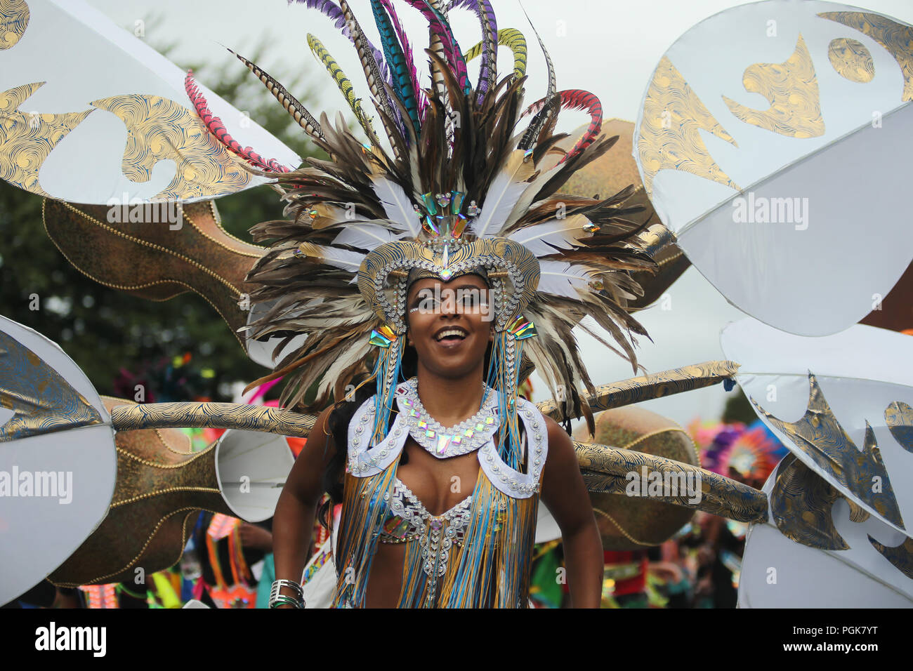 Potternewton Park, Leeds, West Yorkshire, 27th August 2018.   Performers participate in the Leeds West Indian Carnival 2018 in Leeds, UK, on Aug. 27th, 2018. The Leeds West Indian Carnival, is celebrating is 51th year in the city of Leeds. The carnival was originated in 1967 by Arthur France as a way for Afro-Caribbean communities to celebrate their own cultures and traditions, and is one of the biggest West Indian carnivals outside of London.   Credit: Stephen Gaunt/Touchlinepics.com/Alamy Live News Stock Photo
