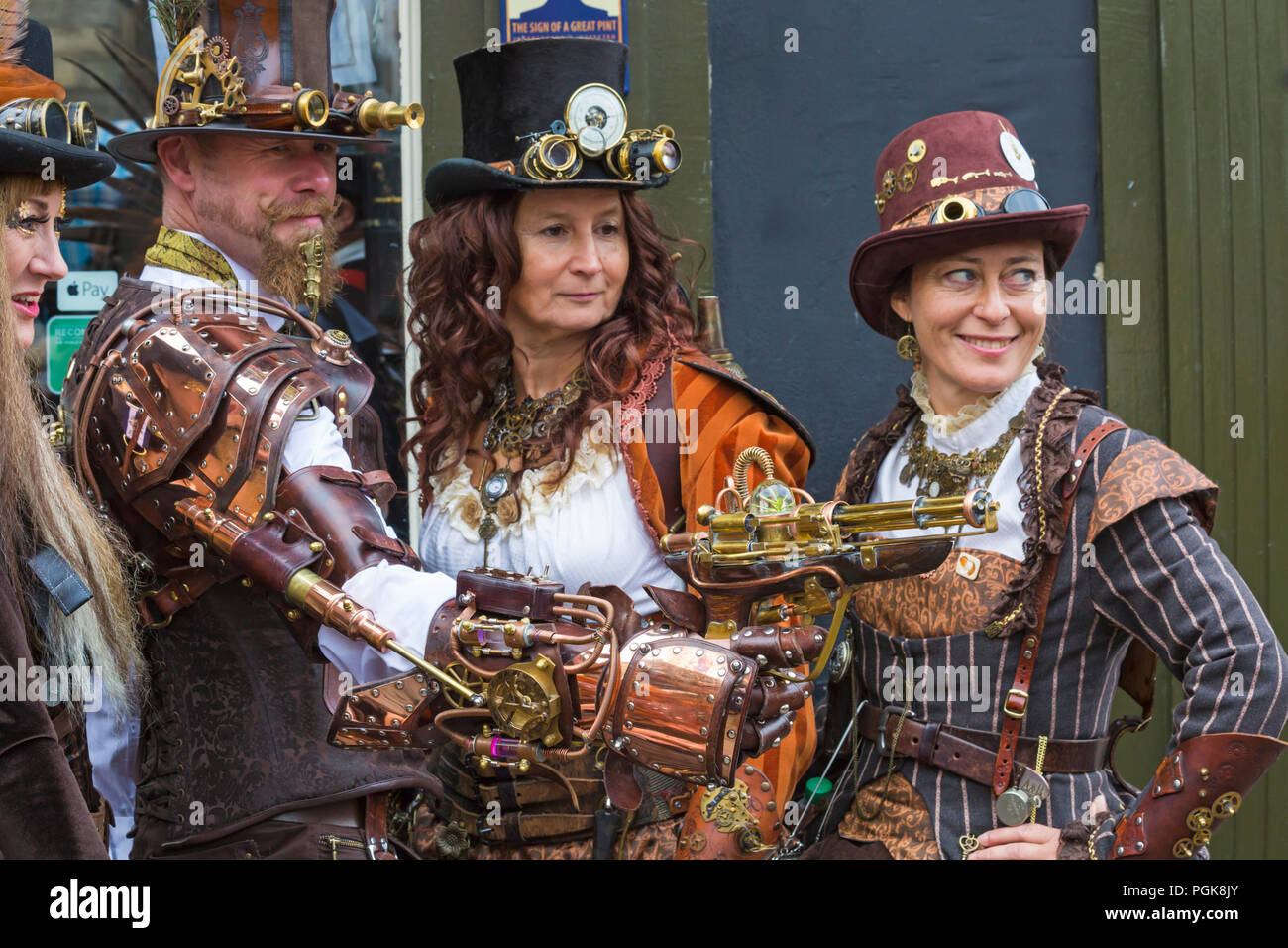 Lincoln, UK. 27th Aug 2018. The Asylum Steampunk Festival at Lincoln, in its 10th year, attracts visitors from all over the world. The biggest and longest steampunk festival in Europe, celebrates a steam powered world in the late 19th century, dressing in Victorian style with accessories that look like parts of machinery, cogs and gears. Credit: Carolyn Jenkins/Alamy Live News - Steampunk fashion, Steampunk clothing Stock Photo