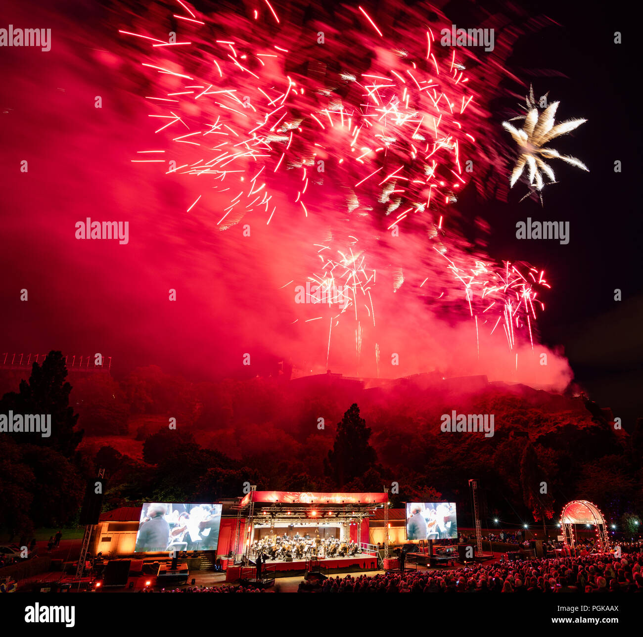 Edinburgh, Scotland, UK. 27 August, 2018. The Edinburgh International Festival concluded with the Virgin Money Fireworks Concert in Princes Street Gardens with a backdrop of Edinburgh Castle. Music by the Scottish Chamber Orchestra playing The Planets by Gustav Holst. Credit: Iain Masterton/Alamy Live News Stock Photo