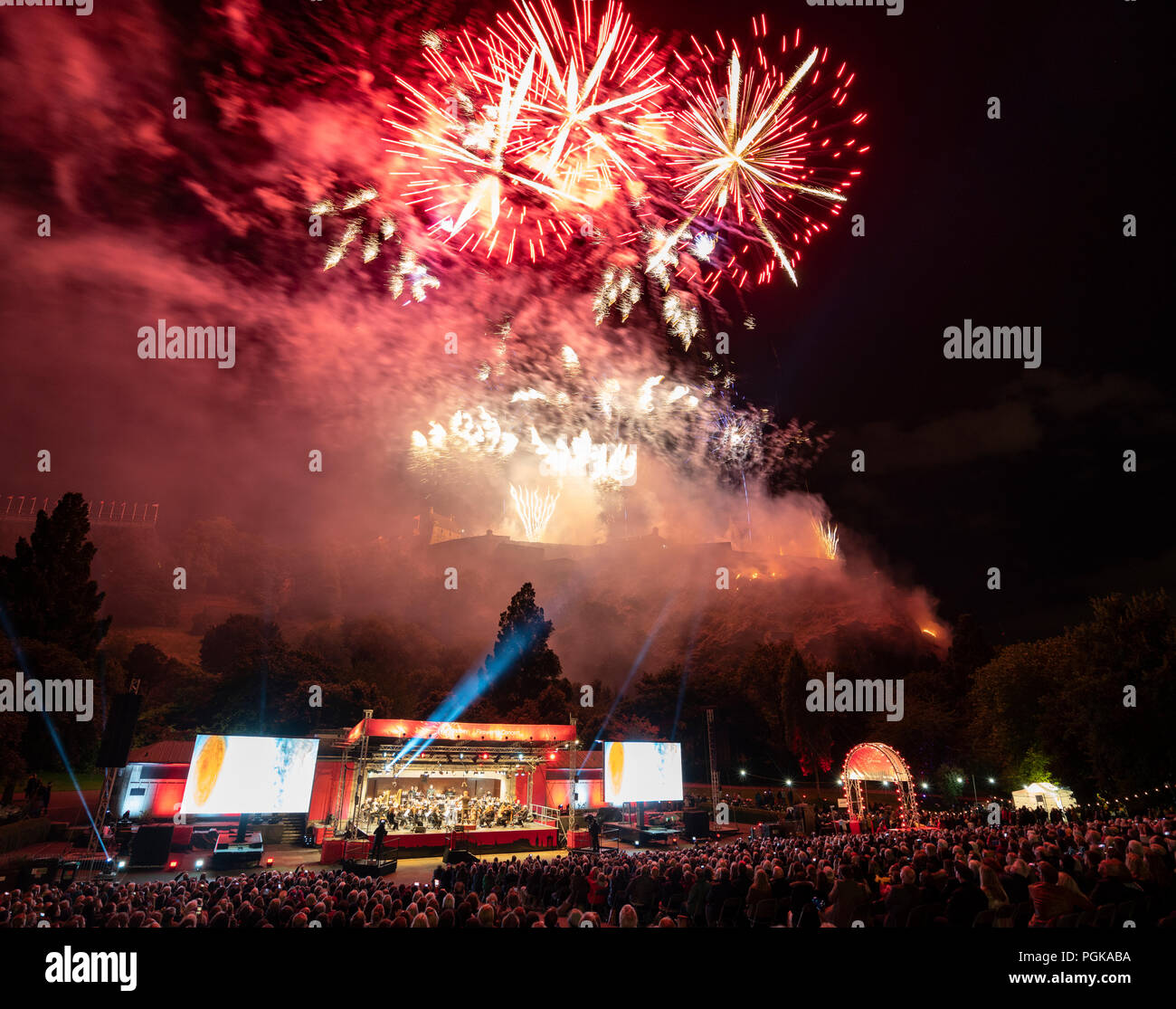 Edinburgh, Scotland, UK. 27 August, 2018. The Edinburgh International Festival concluded with the Virgin Money Fireworks Concert in Princes Street Gardens with a backdrop of Edinburgh Castle. Music by the Scottish Chamber Orchestra playing The Planets by Gustav Holst. Credit: Iain Masterton/Alamy Live News Stock Photo