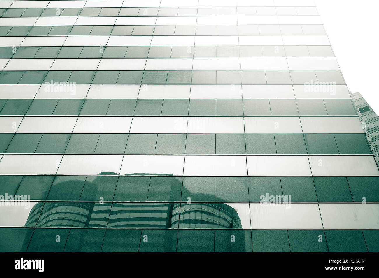 commercial building in Hong Kong with green color Stock Photo - Alamy